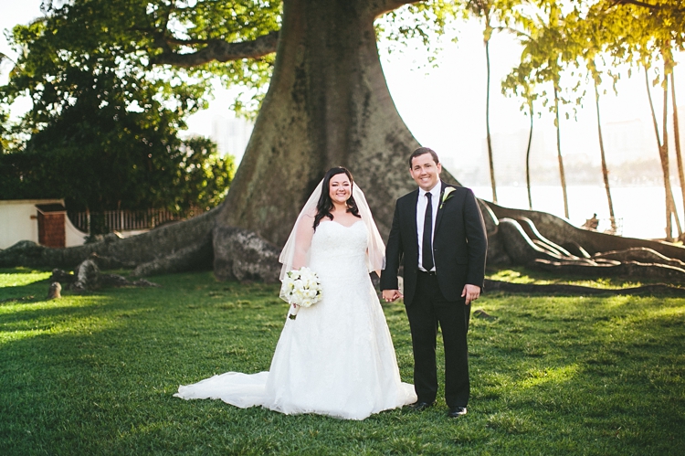 Bride and Groom in front of giant tree Flagler Museum Palm Beach