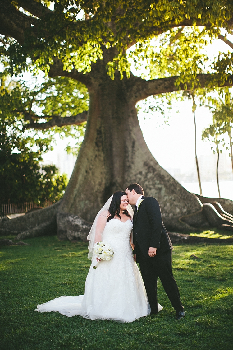 Wedding held by giant tree at Royal Poinciana Chapel Palm Beach